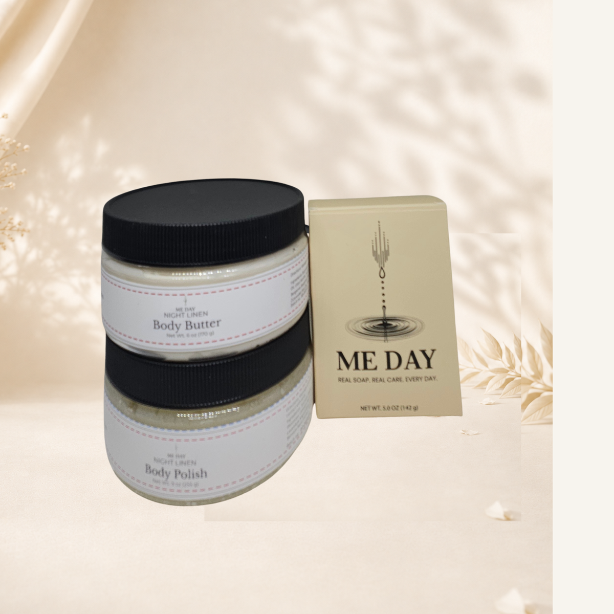 me Day Set - jar of body butter, jar of body polish and a boxed bar of soap in matching scent.